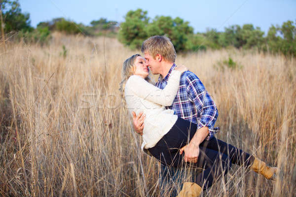 Joven hasta compañera beso Foto stock © avdveen