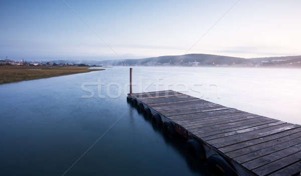 Brumoso amanecer río muelle niebla distancia Foto stock © avdveen