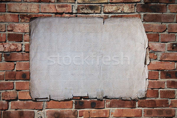 paper on brickwall Stock photo © Avlntn
