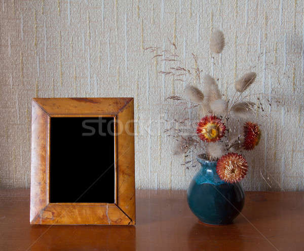 photo-frame on table Stock photo © Avlntn
