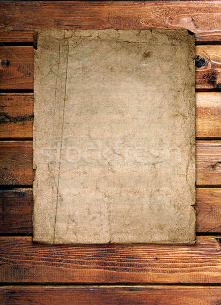 old paper on wood wall Stock photo © Avlntn