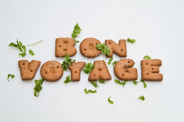 Bon Voyage Biscuits and Leaves Stock photo © azamshah72