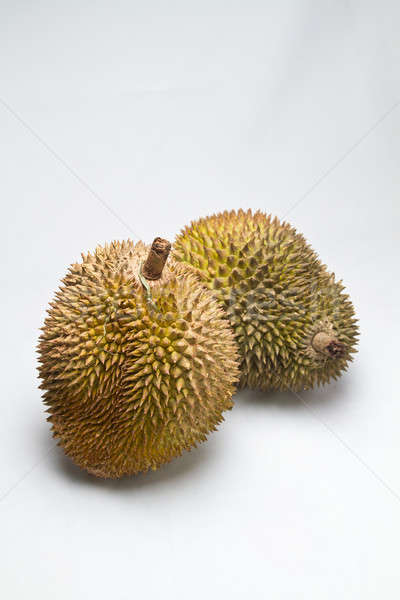 Two Whole Durians on White Background II Stock photo © azamshah72