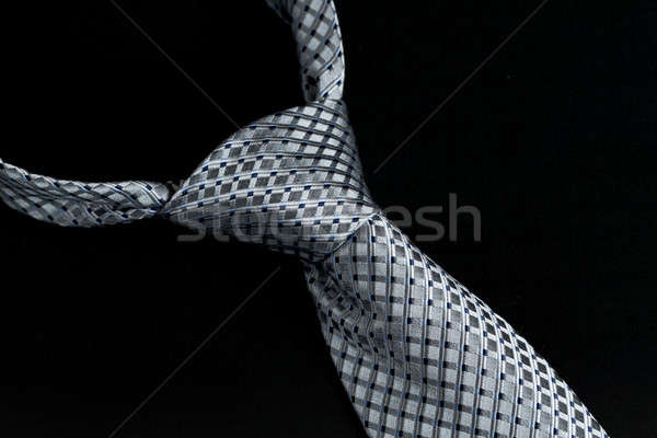 Grey or gray windsor knot on tie isolated against black Stock photo © backyardproductions