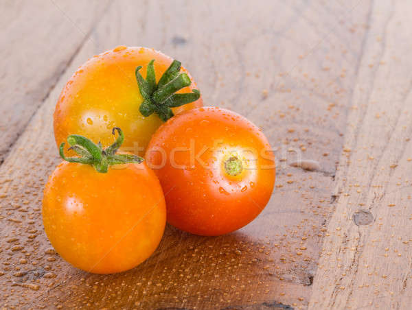 Macro image of three home grown tomatoes Stock photo © backyardproductions