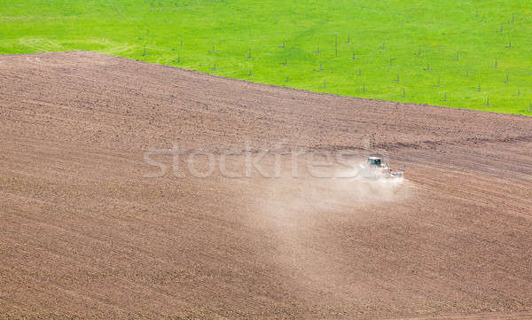 Tractor plows field in Germany in dry conditions Stock photo © backyardproductions