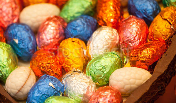 Foil wrapped easter eggs in chocolate egg Stock photo © backyardproductions