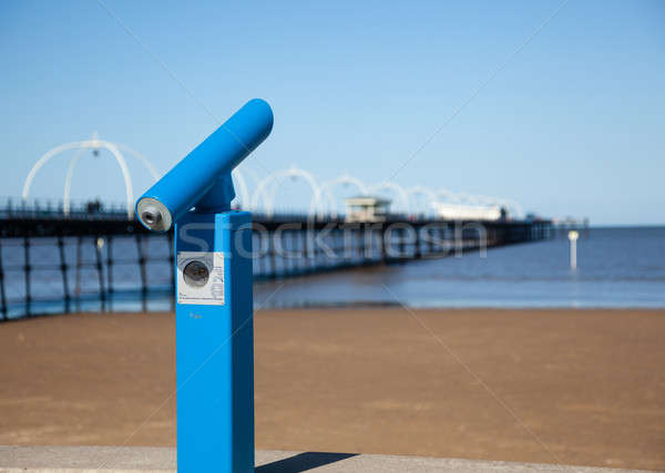 Blue telescope by blurred Southport pier Stock photo © backyardproductions