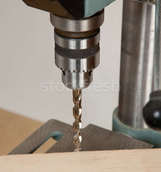 Close up of drill bit above wood Stock photo © backyardproductions