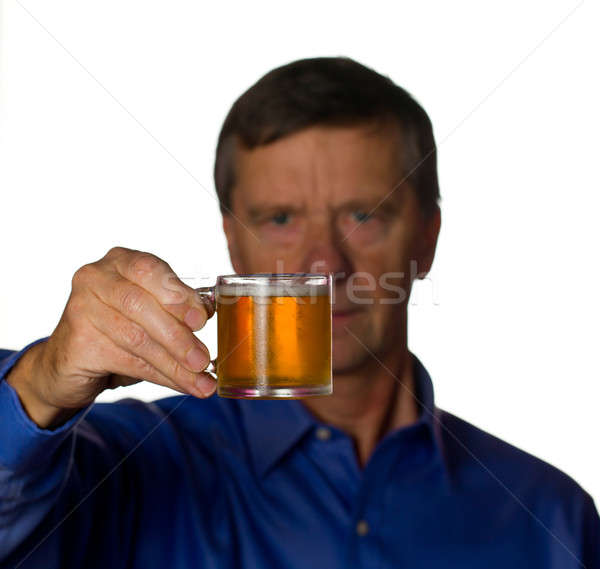 Senior man with glass of beer Stock photo © backyardproductions