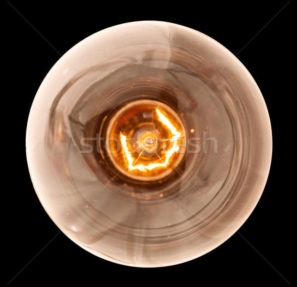 Incandescent light bulb lit from above Stock photo © backyardproductions