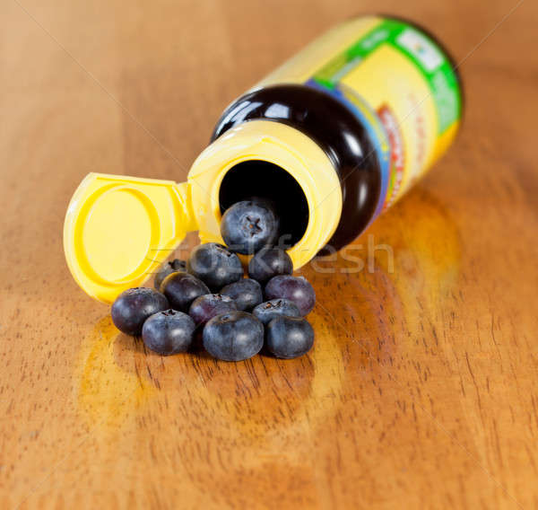 Blueberries in drug bottle Stock photo © backyardproductions