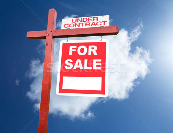 For Sale sign for home in front of blue sky Stock photo © backyardproductions