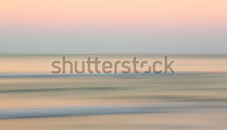 Sunrise over ocean with sideways pan Stock photo © backyardproductions