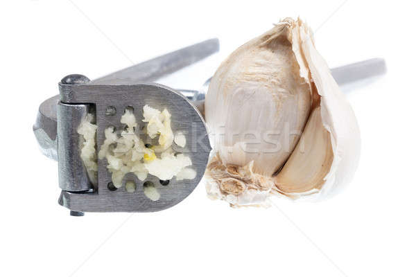 Garlic Press isolated against white Stock photo © backyardproductions