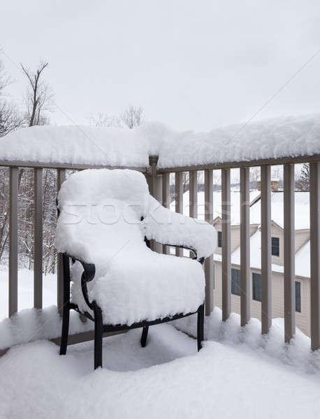 Outdoors garden chair buried in snow drift Stock photo © backyardproductions