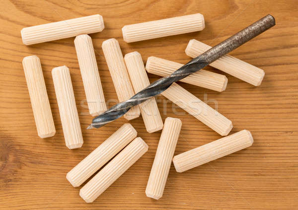 Macro shot of wooden dowels and drill bit Stock photo © backyardproductions