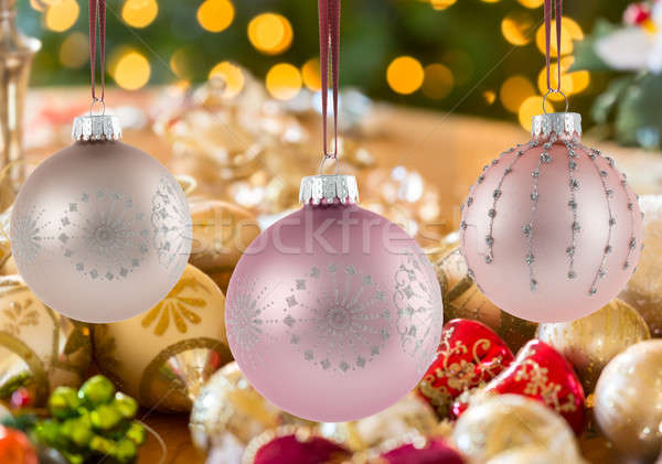 Three Christmas decorations on strings Stock photo © backyardproductions