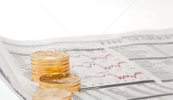 Golden Eagle coins on newspaper Stock photo © backyardproductions