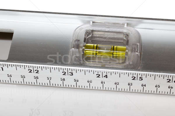 Builders spirit level in aluminum ruler Stock photo © backyardproductions
