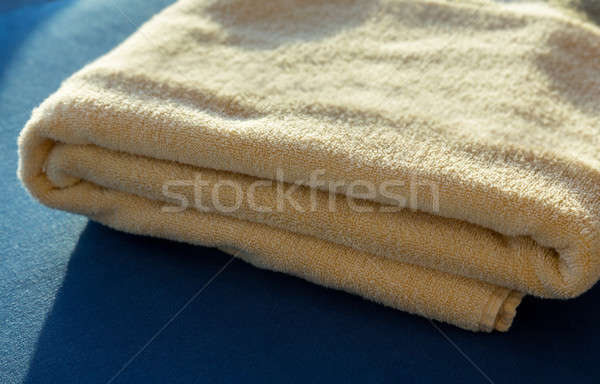 Sun shining on  yellow bath towels Stock photo © backyardproductions