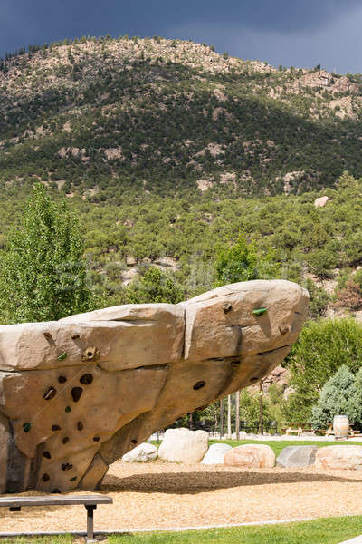 Climbing wall with mountains in background Stock photo © backyardproductions