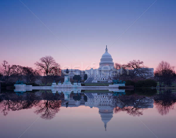 Sunrise behind the dome of the Capitol in DC Stock photo © backyardproductions