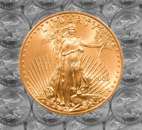 Single Liberty gold coin Stock photo © backyardproductions