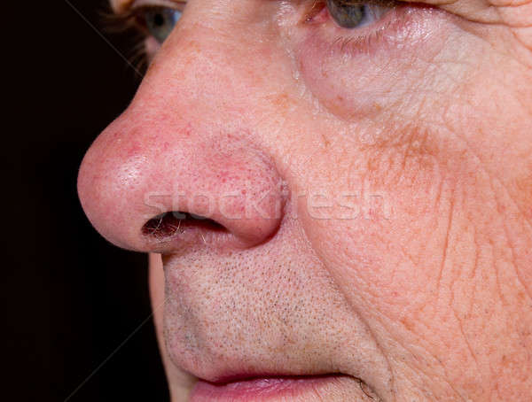 Stock photo: Extreme close up of senior nose in side view