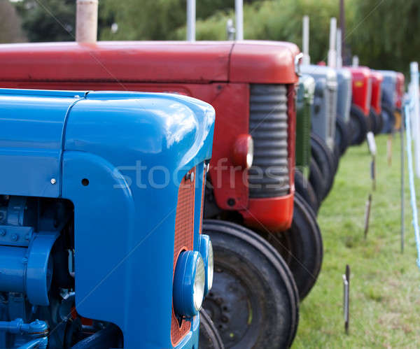 Row of old tractors Stock photo © backyardproductions