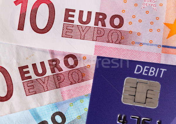 Chip and pin debit card on macro of euro Stock photo © backyardproductions