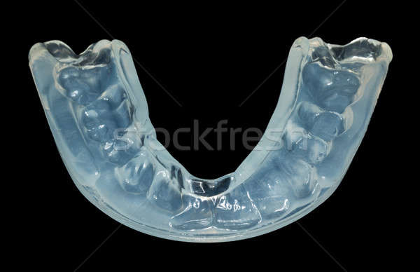Dinţi pază izolat macro plastic Imagine de stoc © backyardproductions