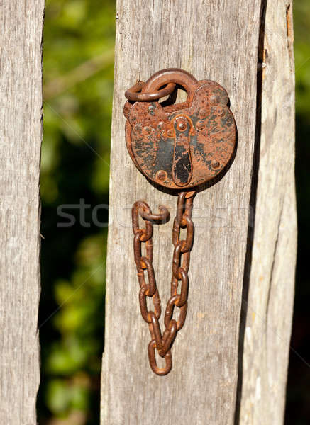 Stock photo: Antique lock and chain on wood