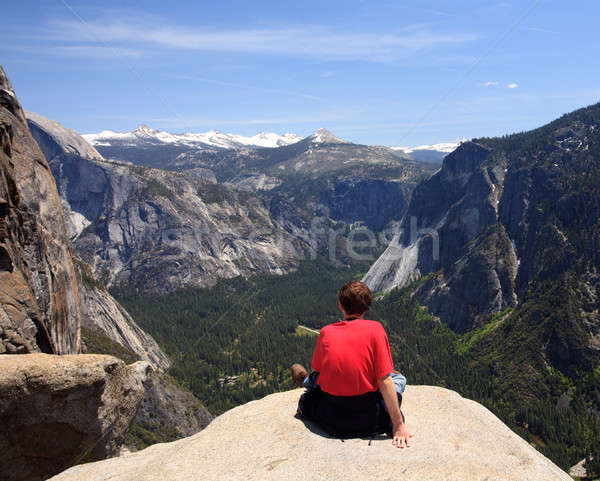 Hiker overlooking Yosemite view Stock photo © backyardproductions