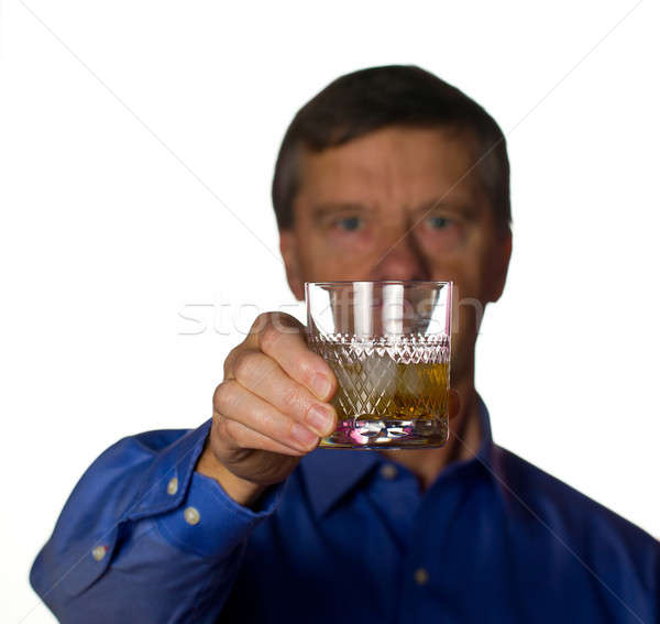 Senior man with glass of whisky Stock photo © backyardproductions