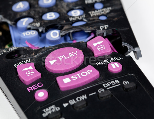 Control de la distanţă spart concentra joacă buton opri Imagine de stoc © backyardproductions