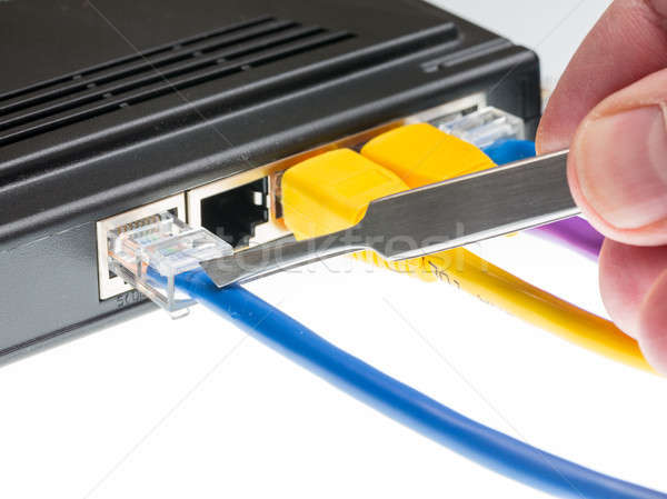 Cat5 cables and router for cyberdefence concept Stock photo © backyardproductions