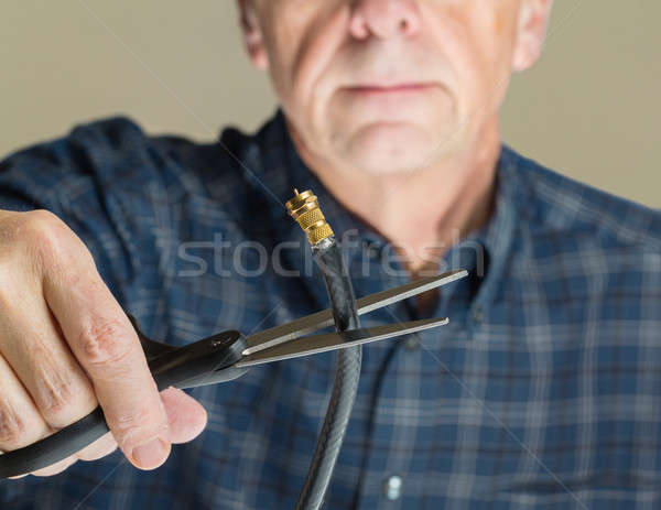 Concept isolated photo of cutting cable cord Stock photo © backyardproductions