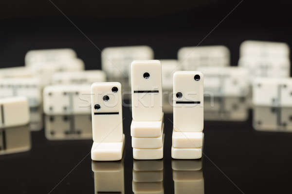 White dominoes showing leader or winner Stock photo © backyardproductions