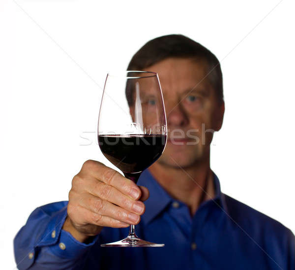 Senior man with glass of red wine Stock photo © backyardproductions