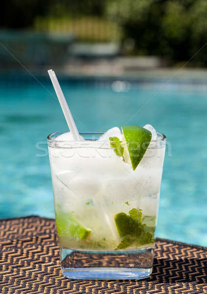 Cocktail Majito on edge by poolside Stock photo © backyardproductions