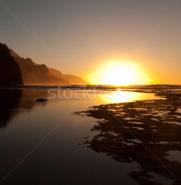 Misty sunset on Na Pali coastline Stock photo © backyardproductions