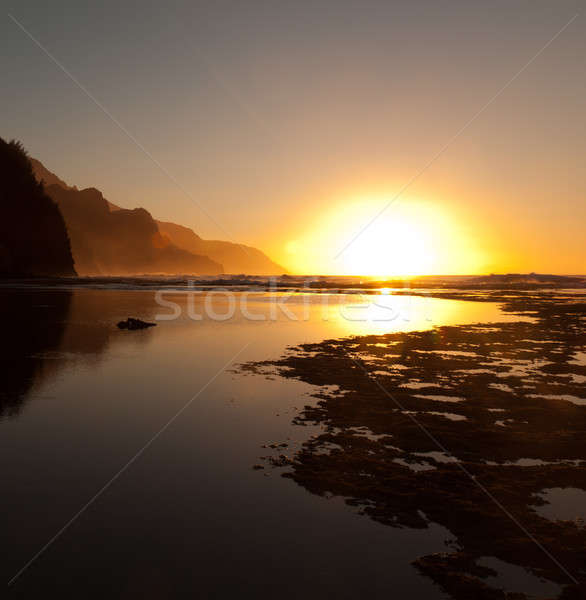 Misty coucher du soleil réflexions soleil côte [[stock_photo]] © backyardproductions