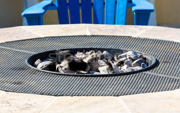 Modern firepit with white hot coals Stock photo © backyardproductions