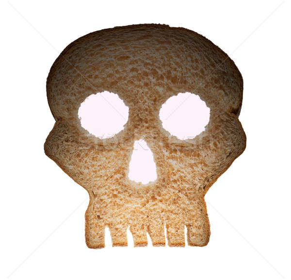 Slice of wholewheat bread in shape of skull Stock photo © backyardproductions