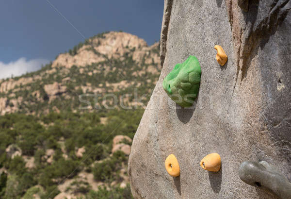 Climbing wall with mountains in background Stock photo © backyardproductions