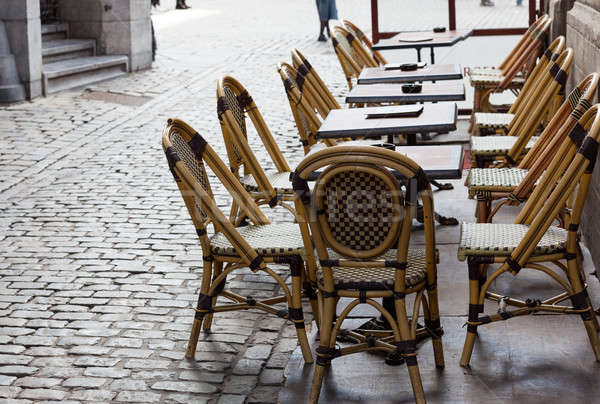 Empty cafe tables in Brussels cobbled square Stock photo © backyardproductions