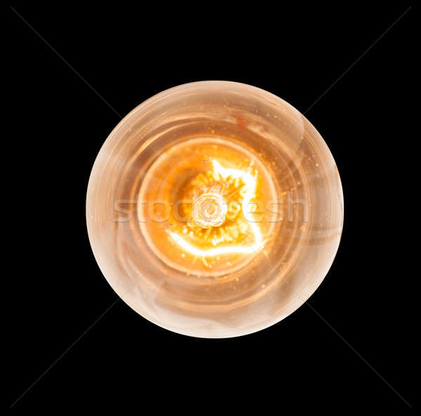 Incandescent light bulb lit from above Stock photo © backyardproductions