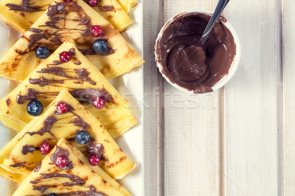 Sweet pancakes and fruit Stock photo © badmanproduction