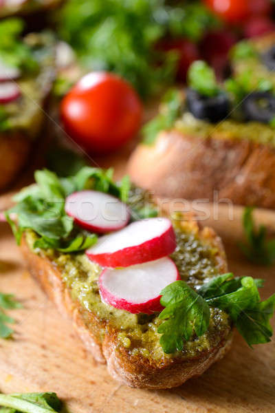 Bruschettast with pesto Stock photo © badmanproduction
